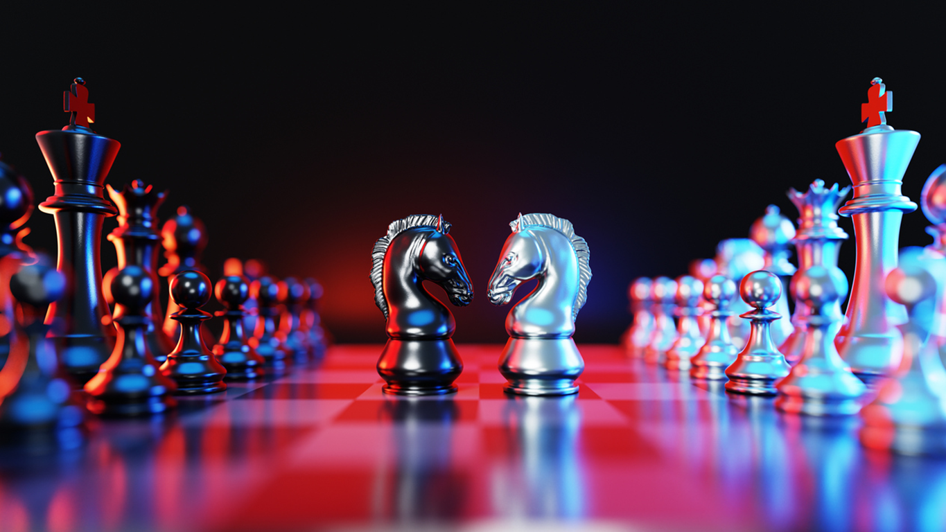 Chess pieces positioned in opposition on a board, symbolising the strategic contest between AI-driven cyber threats and enterprise defence teams.