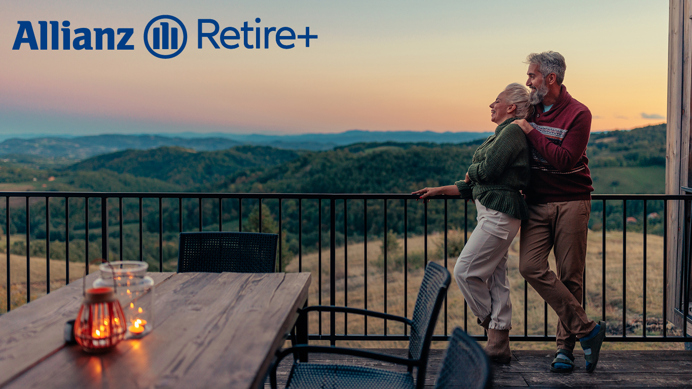 An older couple looking out over a scenic hillside landscape, with the Allianz Retire+ logo overlaid in the upper left corner.